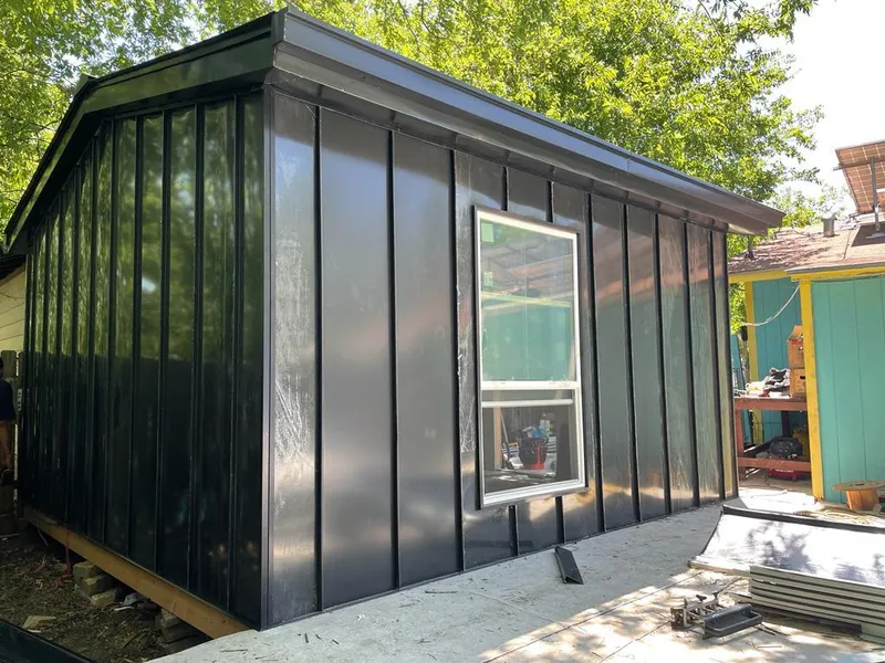 Black standing seam metal wall panels for Roof Inspection in Davidson