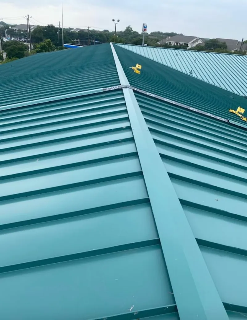 Green commercial metal roof ridge and valley for Metal Roof Repair in Davidson